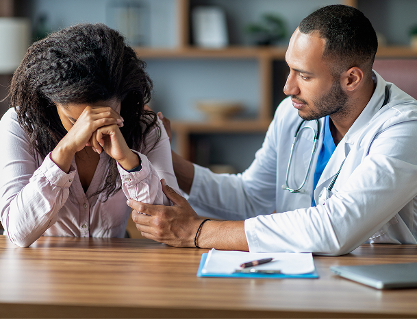 attentive-arabic-doctor-supporting-sad-black-woman-2025-03-18-18-12-56-utc 2